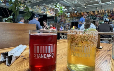 Craft beer taps and frozen cocktail slushies at Standard Beer and Food